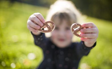 Little girl with pretzel